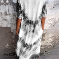 Full size pocketed tie-dye short sleeve dress in black and white.