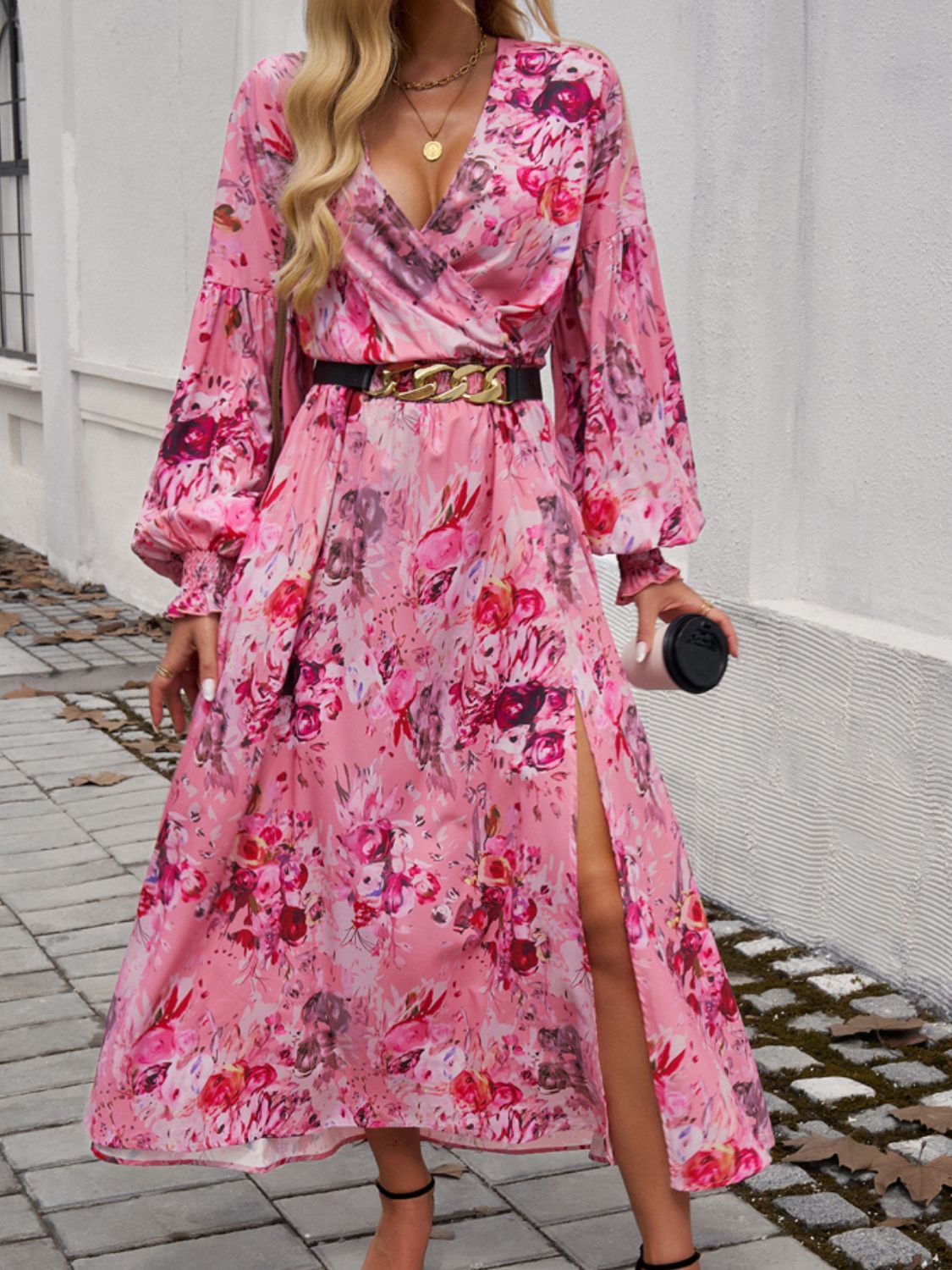 Split printed surplice long sleeve midi dress with floral pattern and side slit.