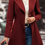 Collared neck button-up long sleeve coat in maroon, 95% polyester and 5% spandex, worn over a cream turtleneck sweater.