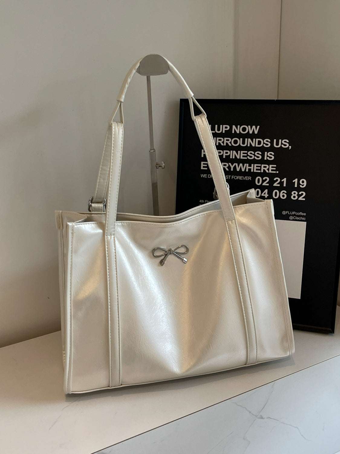 PU Leather Bow Shoulder Bag in white with spacious design and durable material.