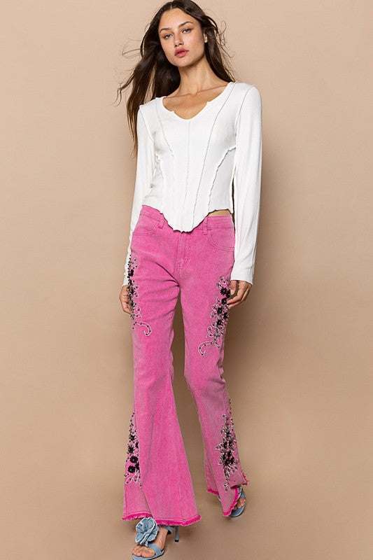 POL Raw Hem Embroidered Flare Pants with intricate embroidery and retro flare silhouette.