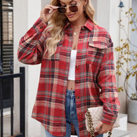 Mandy Plaid Button Up Long Sleeve Shirt in red and black with front pockets, worn by model with sunglasses and quilted purse.