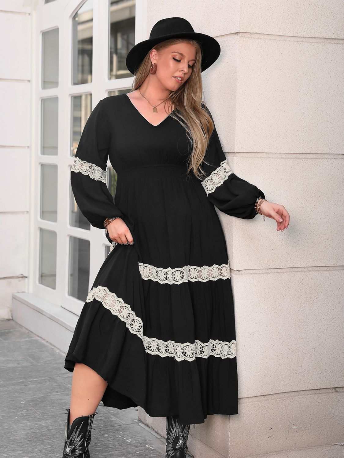 Plus size V-neck long sleeve midi dress with lace detail, slightly stretchy viscose fabric.