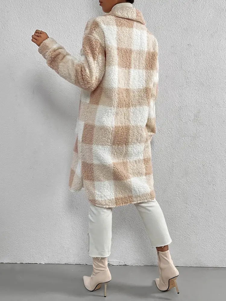 Plaid collared neck button down coat in beige and white worn by model.