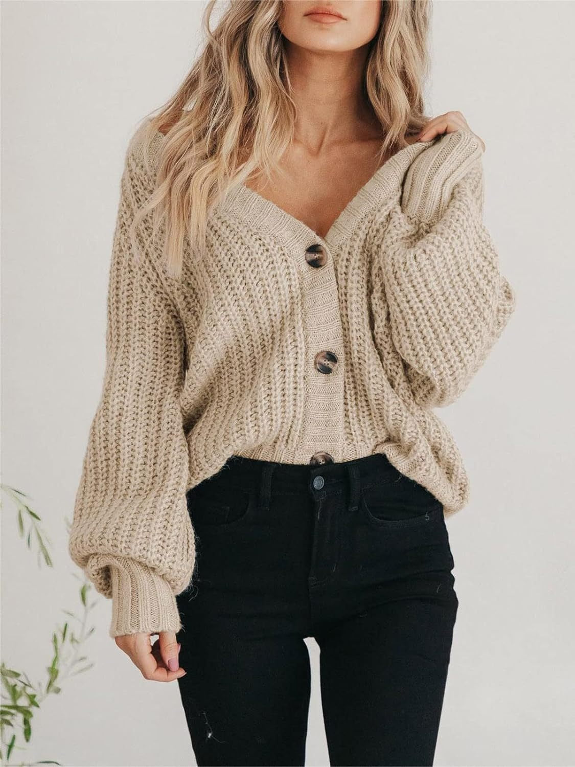 Long Sleeve Cardigan in beige knit with button-up design.