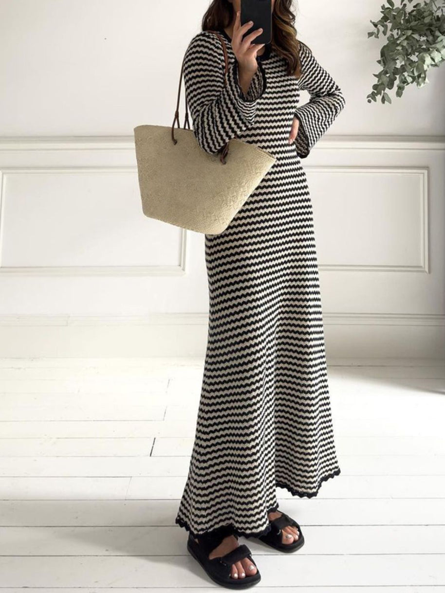 Devine Tied Round Neck Striped Sweater Dress with black and white stripes, long sleeves, and a relaxed fit.