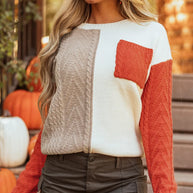 Color block round neck long sleeve sweater with pocket feature.