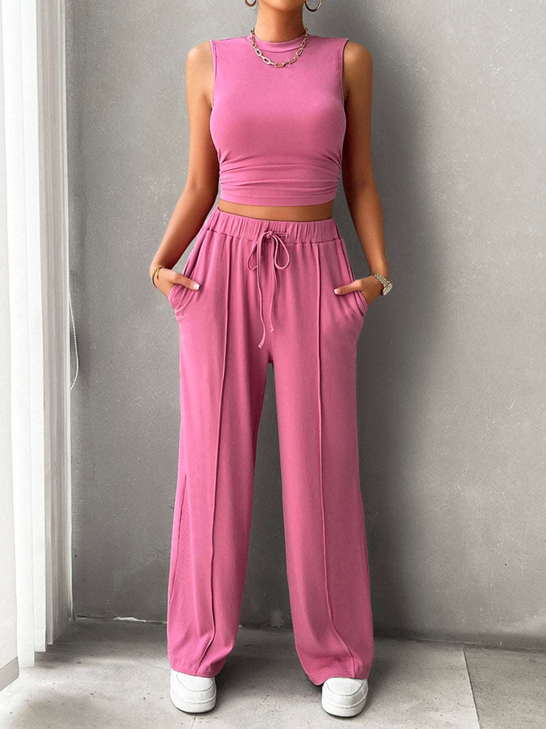 Devine Mock Neck Sleeveless Top and Drawstring Pants Set in pink, pocketed design, stretchy fabric.