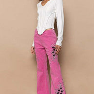 POL Raw Hem Embroidered Flare Pants with floral designs and bohemian style.