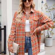 Mandy Plaid Button Up Long Sleeve Shirt with pocket, orange and white plaid design, worn by model.