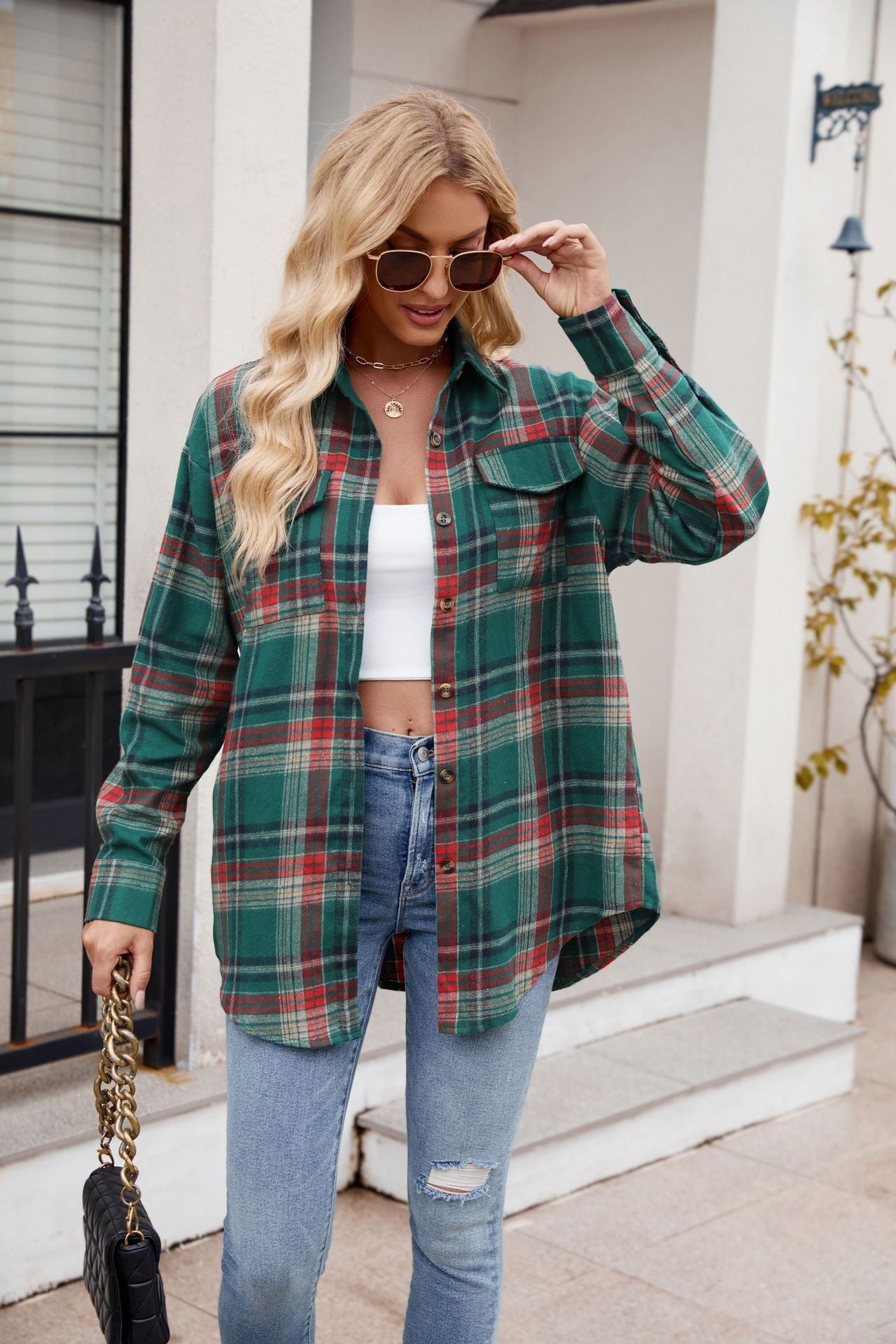 Mandy Plaid Button Up Long Sleeve Shirt in green and red, featuring button closure and pocket, worn by a model with casual attire.