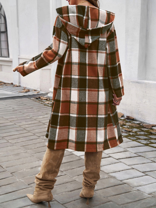 Plaid long sleeve hooded coat with buttoned and pocketed design.