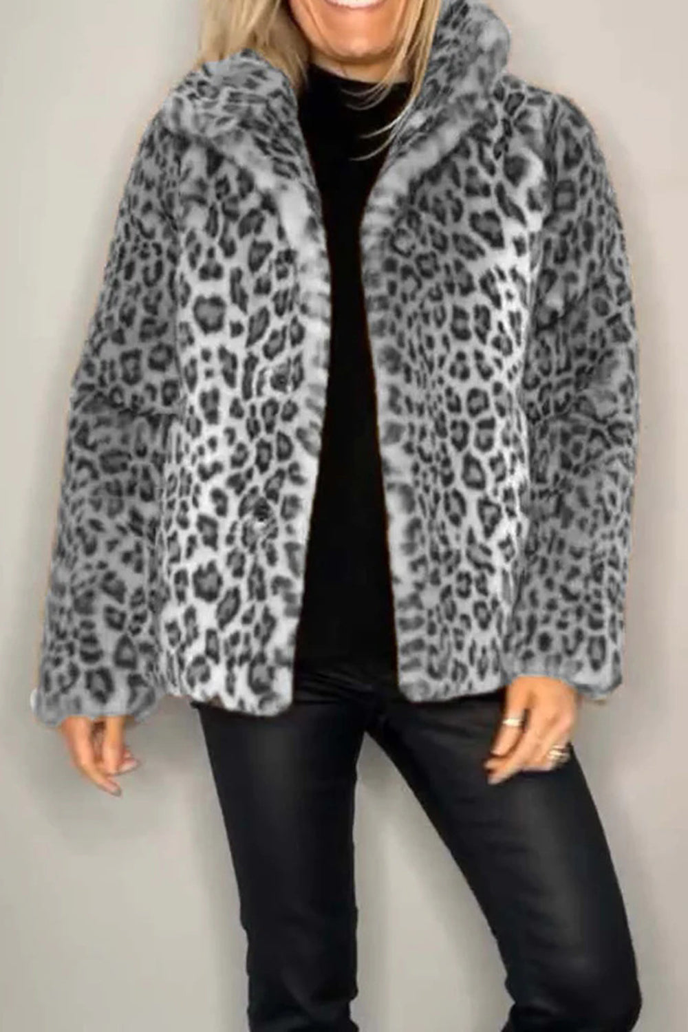 Full size leopard print furry coat with collared neck and long sleeves.