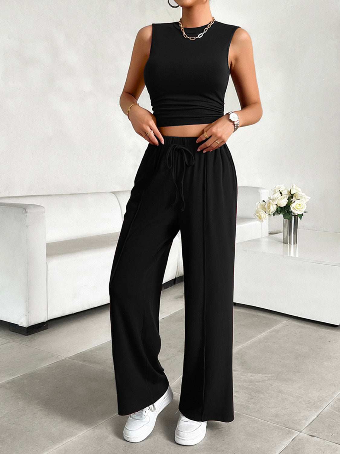 Devine Mock Neck Sleeveless Top and Drawstring Pants Set in black, stretchy and comfortable with pockets.