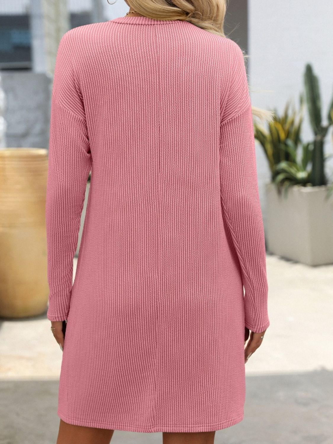 Mandy striped round neck long sleeve mini dress, pink color, back view, highly stretchy material, pocketed.