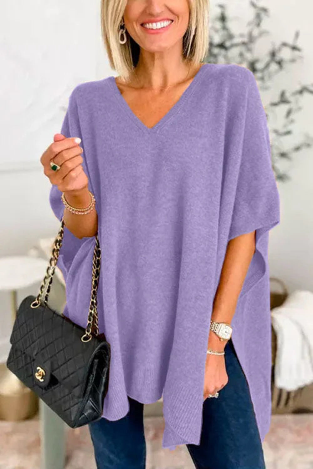 Slit V-Neck Half Sleeve Knit Top in lavender, slightly stretchy fabric.