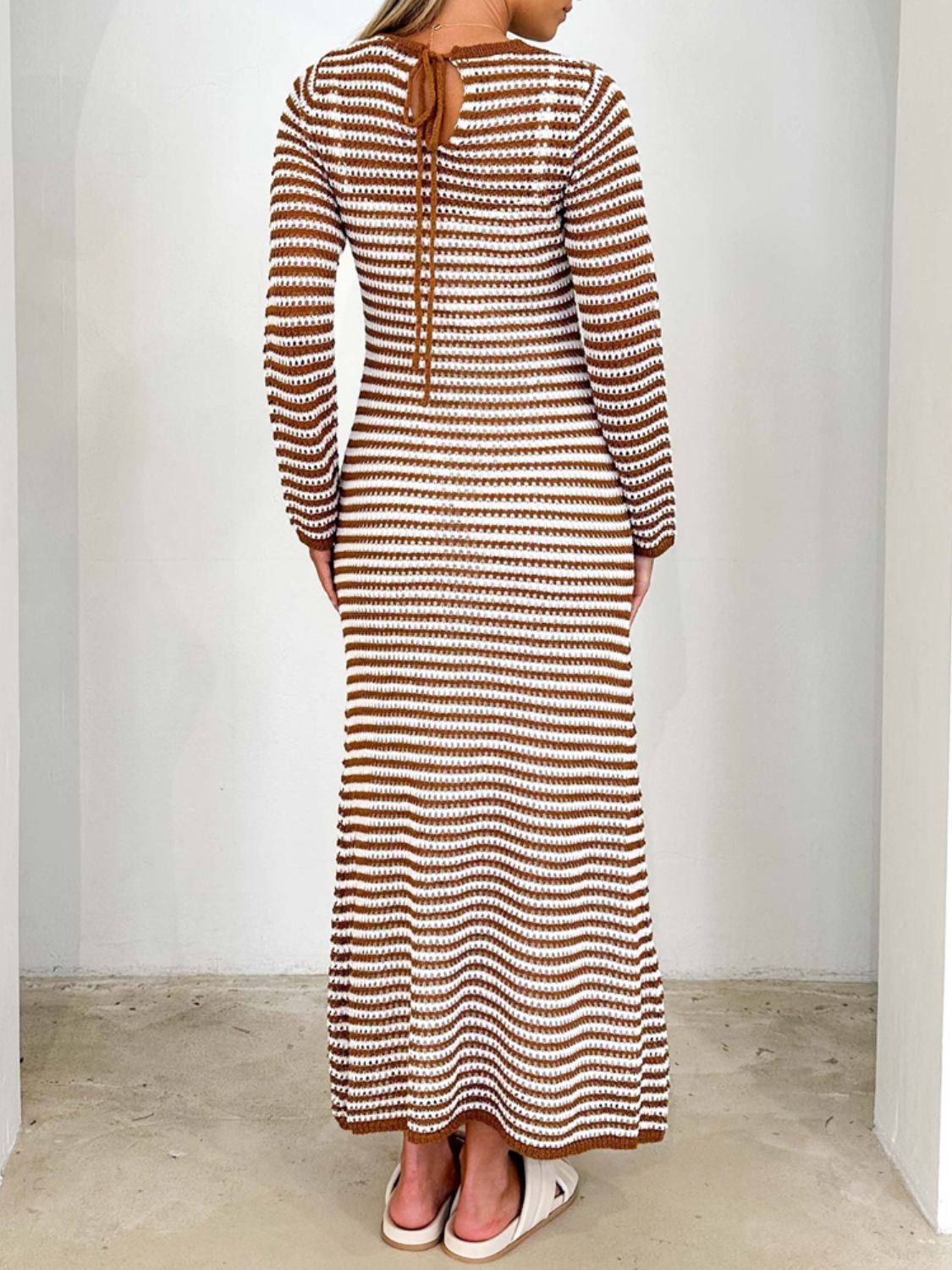 Devine Tied Round Neck Striped Sweater Dress in brown and white viscose with moderate stretch.