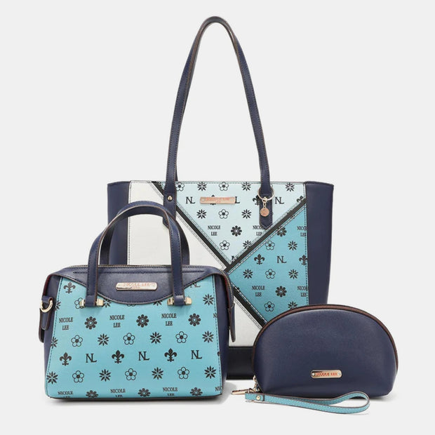 Nicole Lee USA 3-Piece Color Block Handbag Set featuring a large shopper, mini crossbody, and pouch with wristlet; stylish and versatile design.