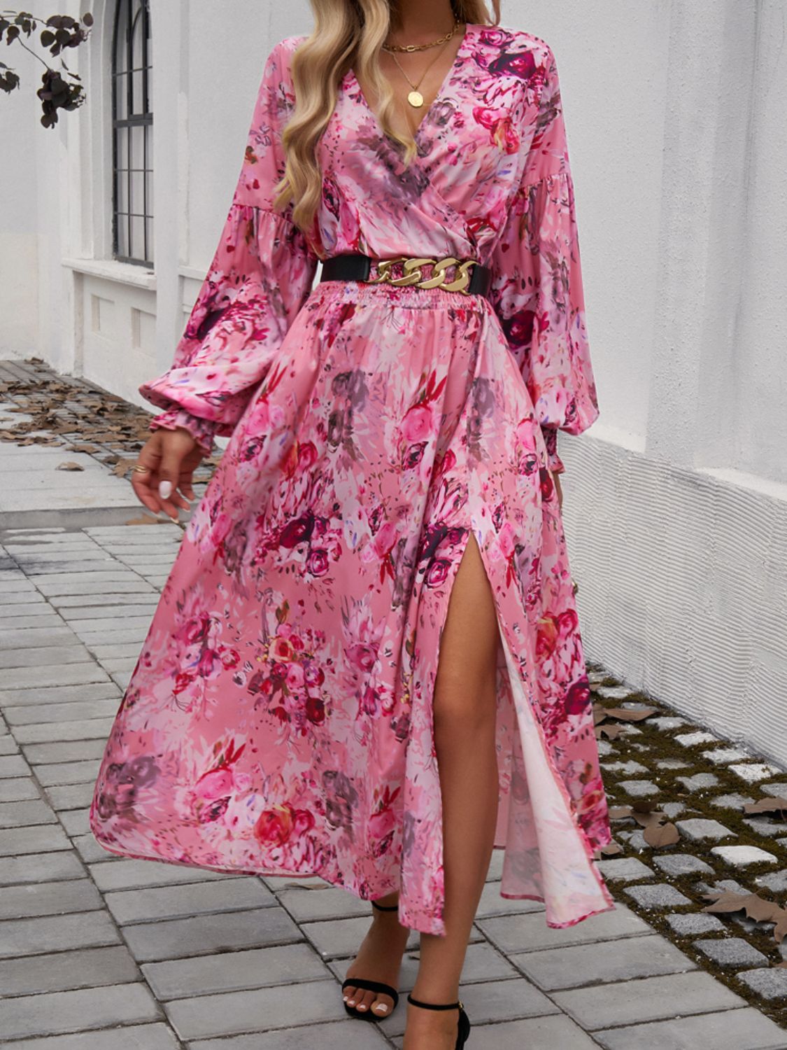 Split printed surplice long sleeve midi dress with floral design and side slit.