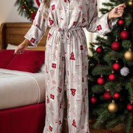 Cozy printed long sleeve top and pants lounge set with holiday pattern, perfect for relaxing.