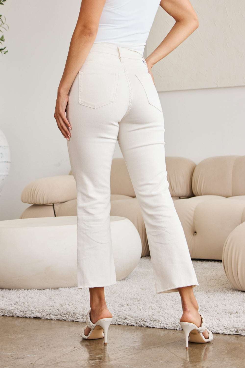 RFM Mini Mia Full Size Tummy Control High Waist Raw Hem Jeans, stylish white denim with a high-waist, moderate stretch, and raw hem design.