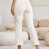 RFM Mini Mia Full Size Tummy Control High Waist Raw Hem Jeans, stylish white denim with a high-waist, moderate stretch, and raw hem design.