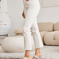 RFM Mini Mia Full Size Tummy Control High Waist Raw Hem Jeans in white, featuring raw hem and moderate stretch for stylish comfort.