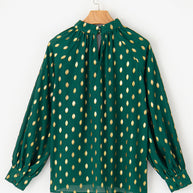 Cutout printed mock neck long sleeve blouse, green with gold pattern.