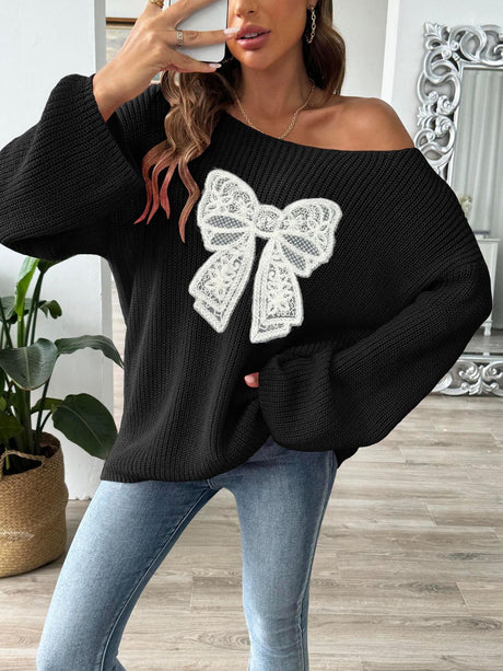 Bow Boat Neck Long Sleeve Sweater with lace bow design, off-shoulder, slightly stretchy knit in black.