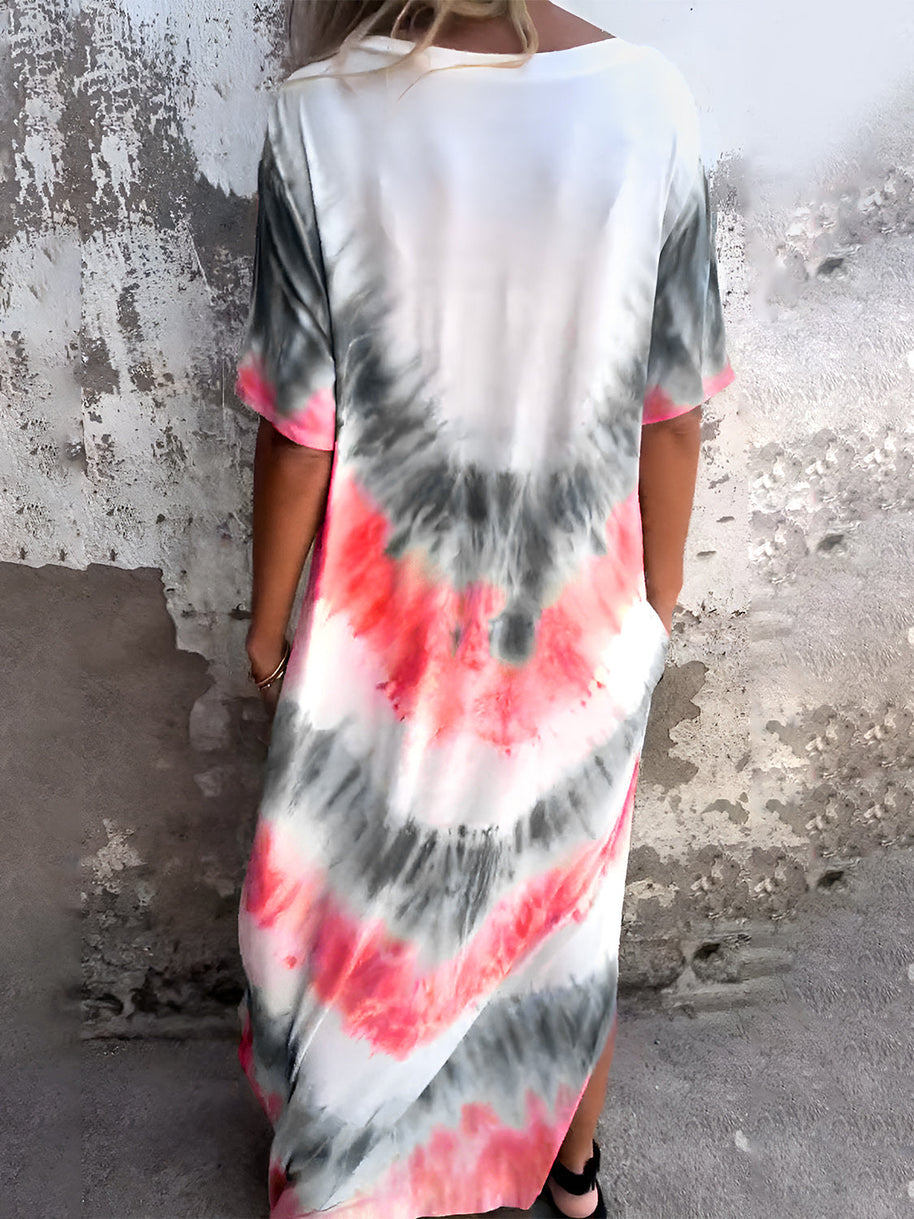 Full Size Pocketed Tie-Dye Short Sleeve Dress with vibrant colors and pockets, made from polyester and spandex.