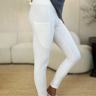 Wide waistband sports leggings in white, stretchy and opaque, made of nylon and spandex.