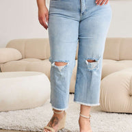 RFM Full Size Tummy Control High Waist Raw Hem Distressed Jeans with pocketed design and moderate stretch.