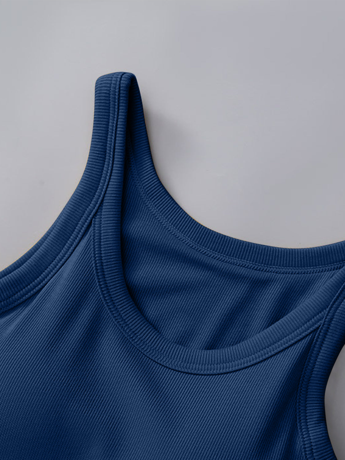 Blue round neck tank top with built-in bra.