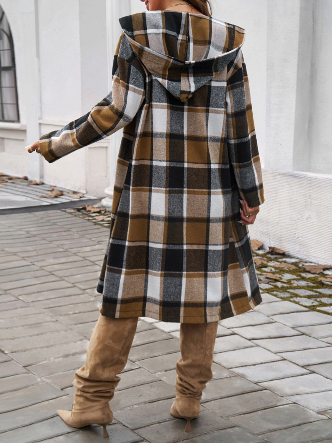 Plaid long sleeve hooded coat with button and pocket features in brown and white.