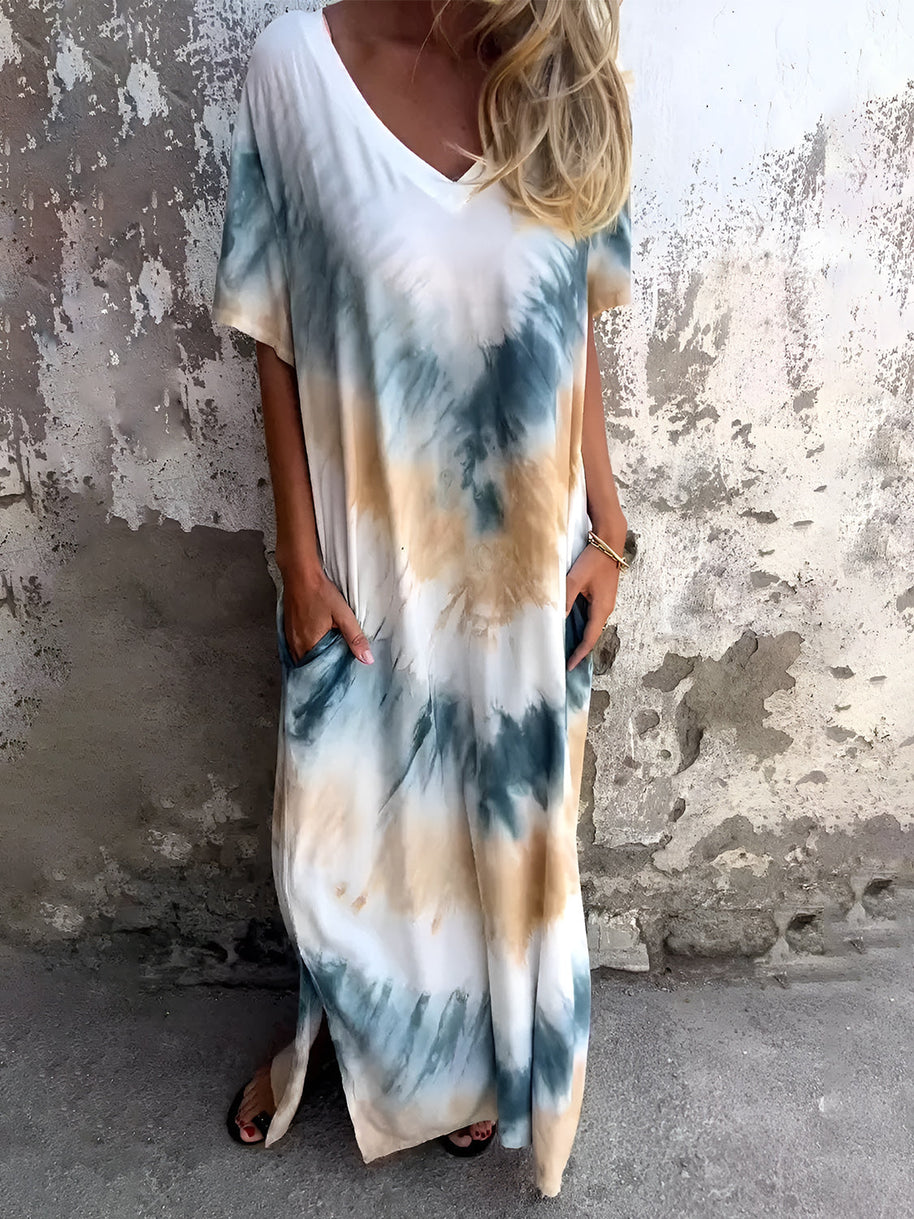 Full size pocketed tie-dye short sleeve dress with blue and beige pattern.