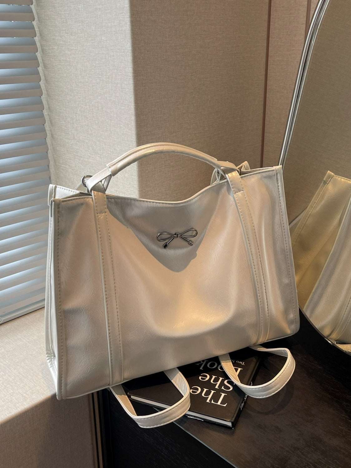 PU Leather Bow Shoulder Bag with spacious design on display.