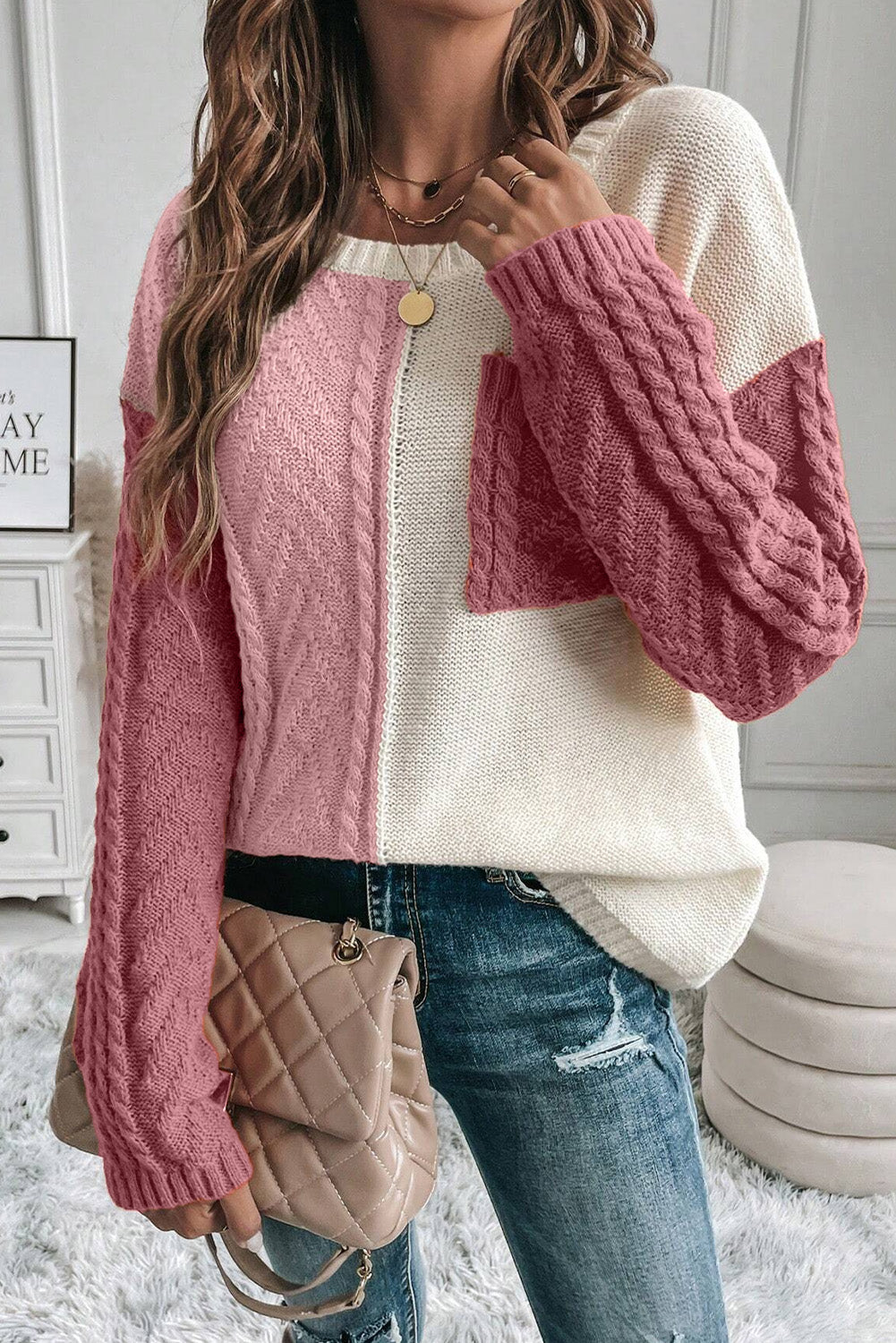 Color block round neck long sleeve sweater with pink and white sections, features pocket, casual style.