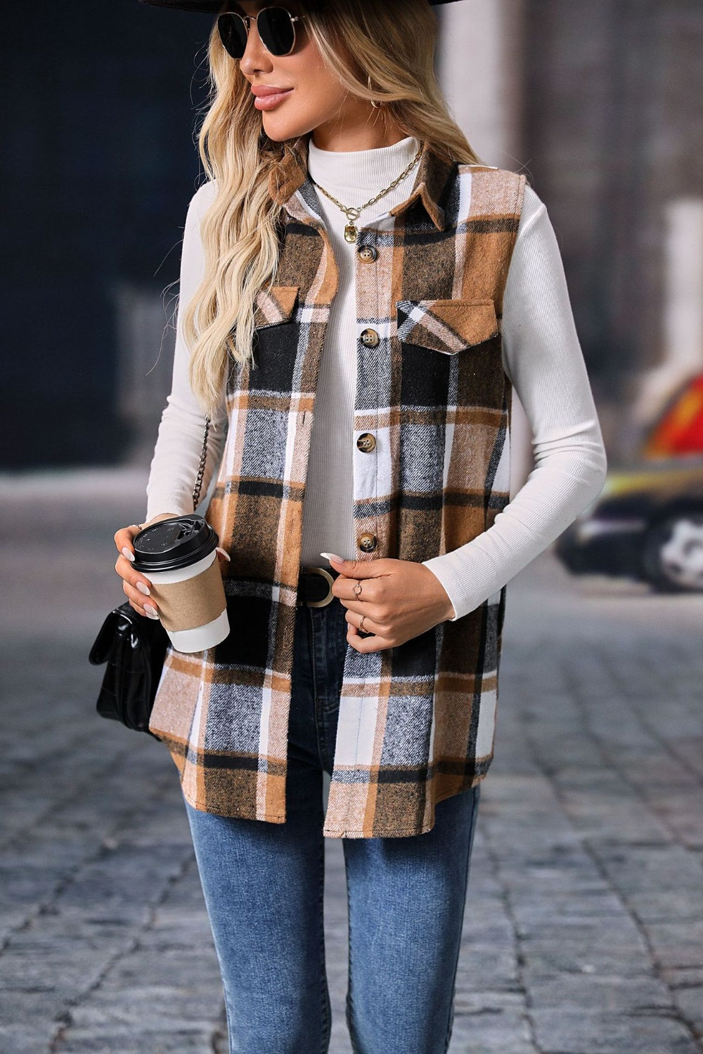 Plaid Button Up Vest Coat with buttoned front, 100% polyester, shown on model wearing white turtleneck and blue jeans.