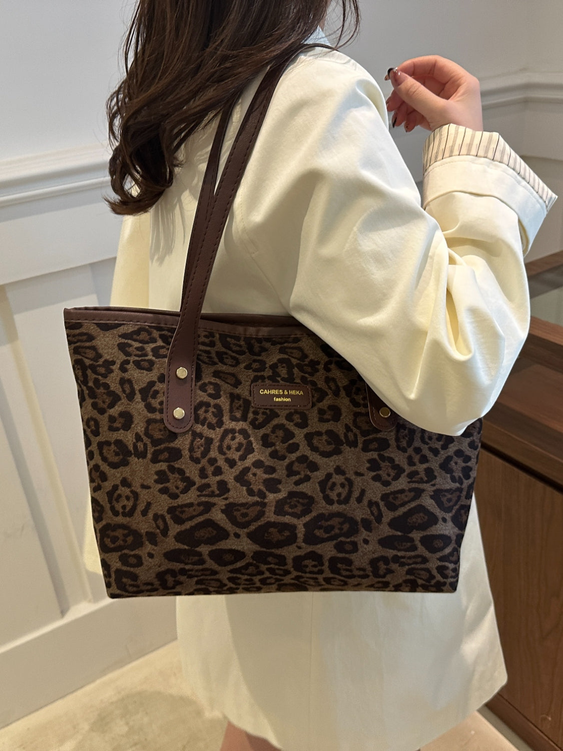 Leopard polyester tote bag, large size, imported, featuring leopard print design.