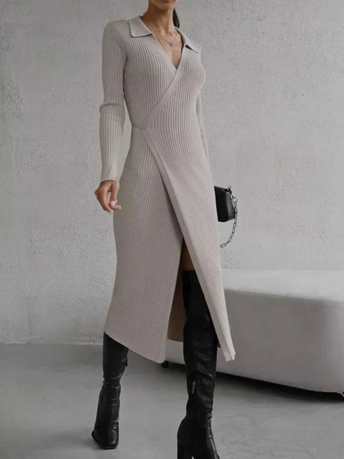 Tied collared neck long sleeve sweater dress with slit in beige.