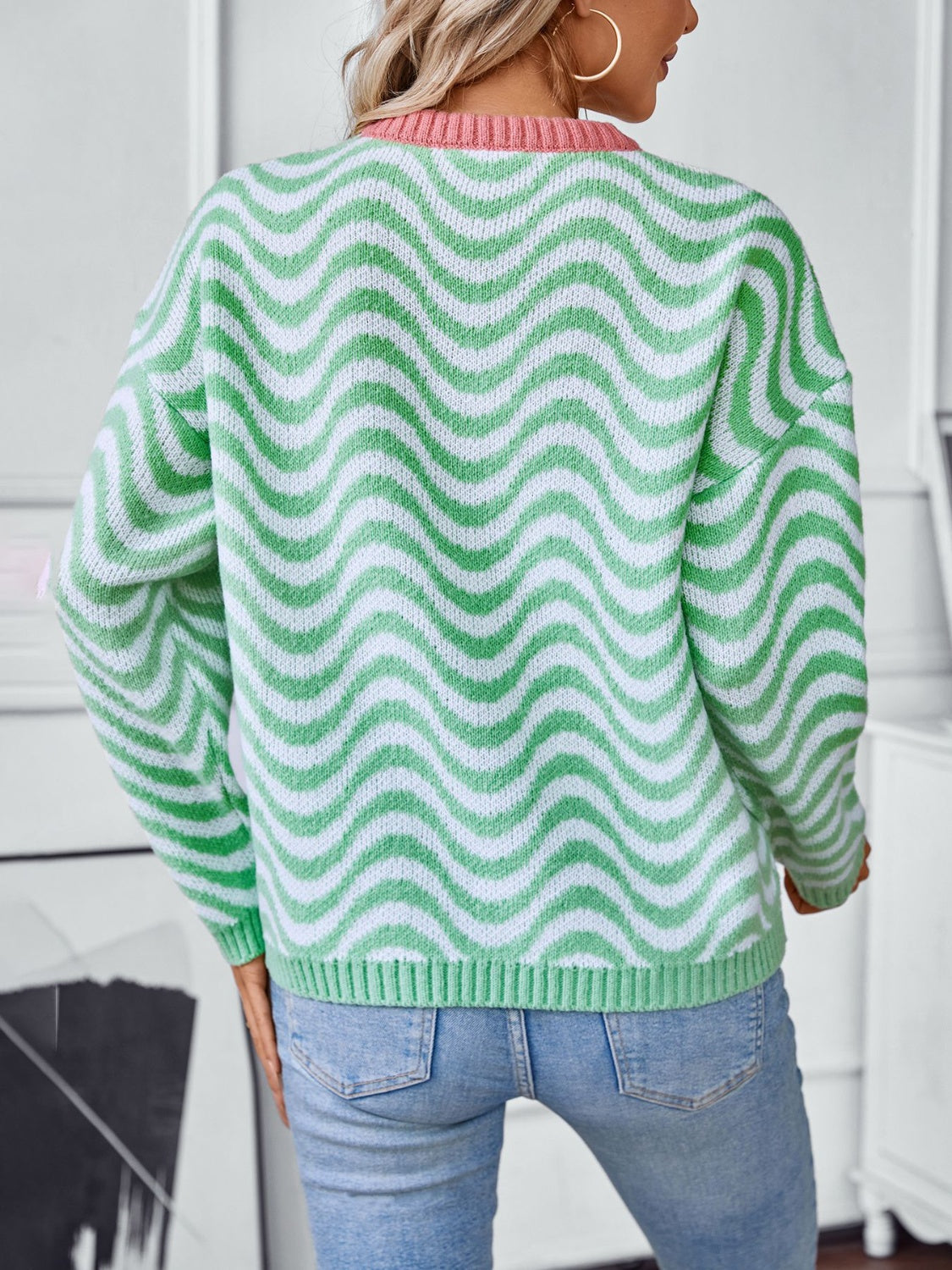 Wavy Stripes Round Neck Long Sleeve Sweater in green and white design.