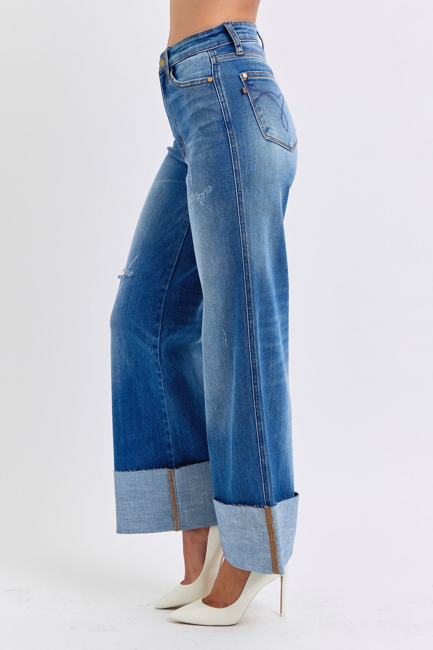 Judy Blue Full Size Distressed High Waist Wide Leg Jeans with edgy detailing and a flattering fit.