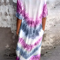 Full size tie-dye short sleeve dress with pockets in purple, white, and gray.