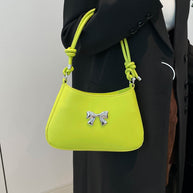 Small bow PU leather knotted strap handbag.