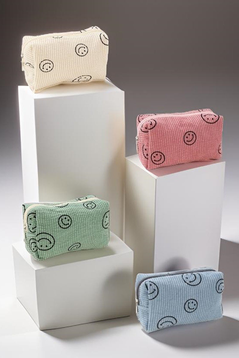 Zenana Smiley Face Corduroy Cosmetic Pouch in multiple colors on display.