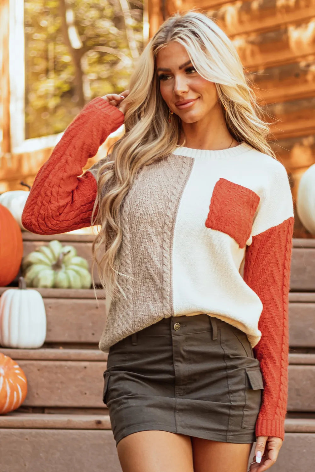 Color block round neck long sleeve sweater with pocket.