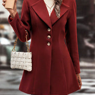 Women's collared neck button-up long sleeve coat in red, featuring a tailored fit and button closure.