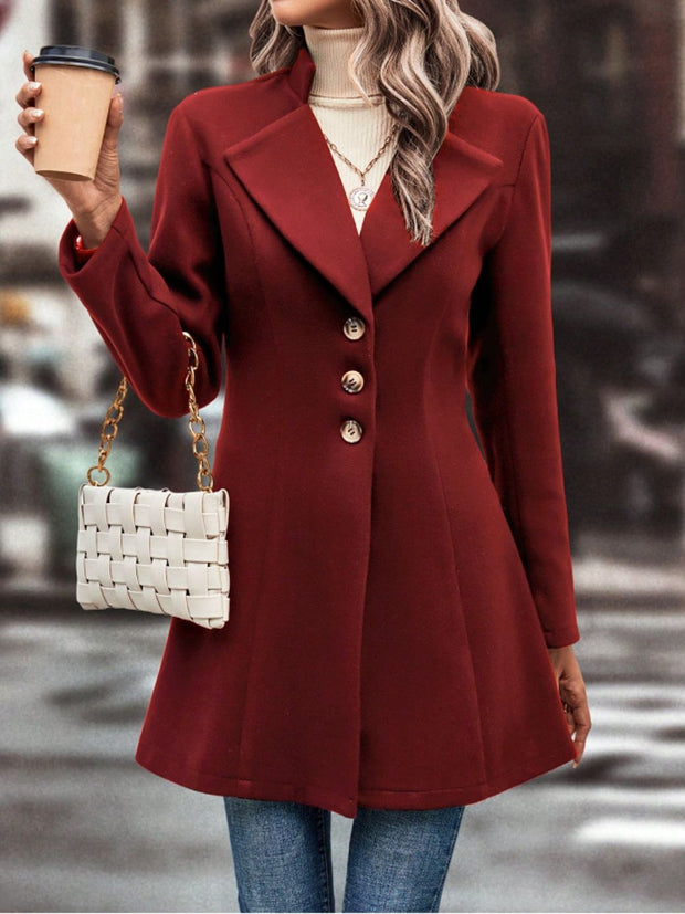 Women's collared neck button-up long sleeve coat in red, featuring a tailored fit and button closure.