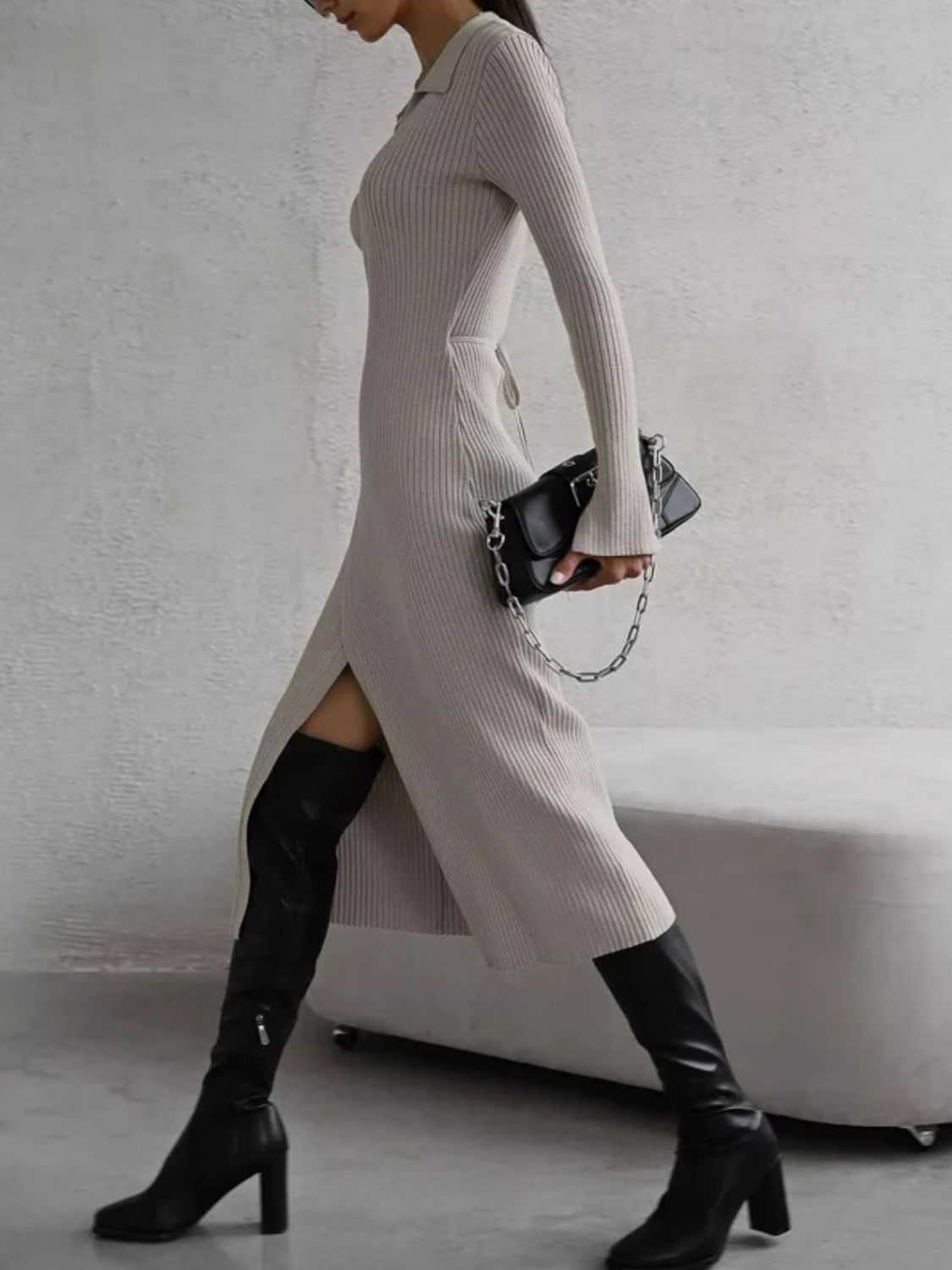 Tied collared neck long sleeve sweater dress with slit design.