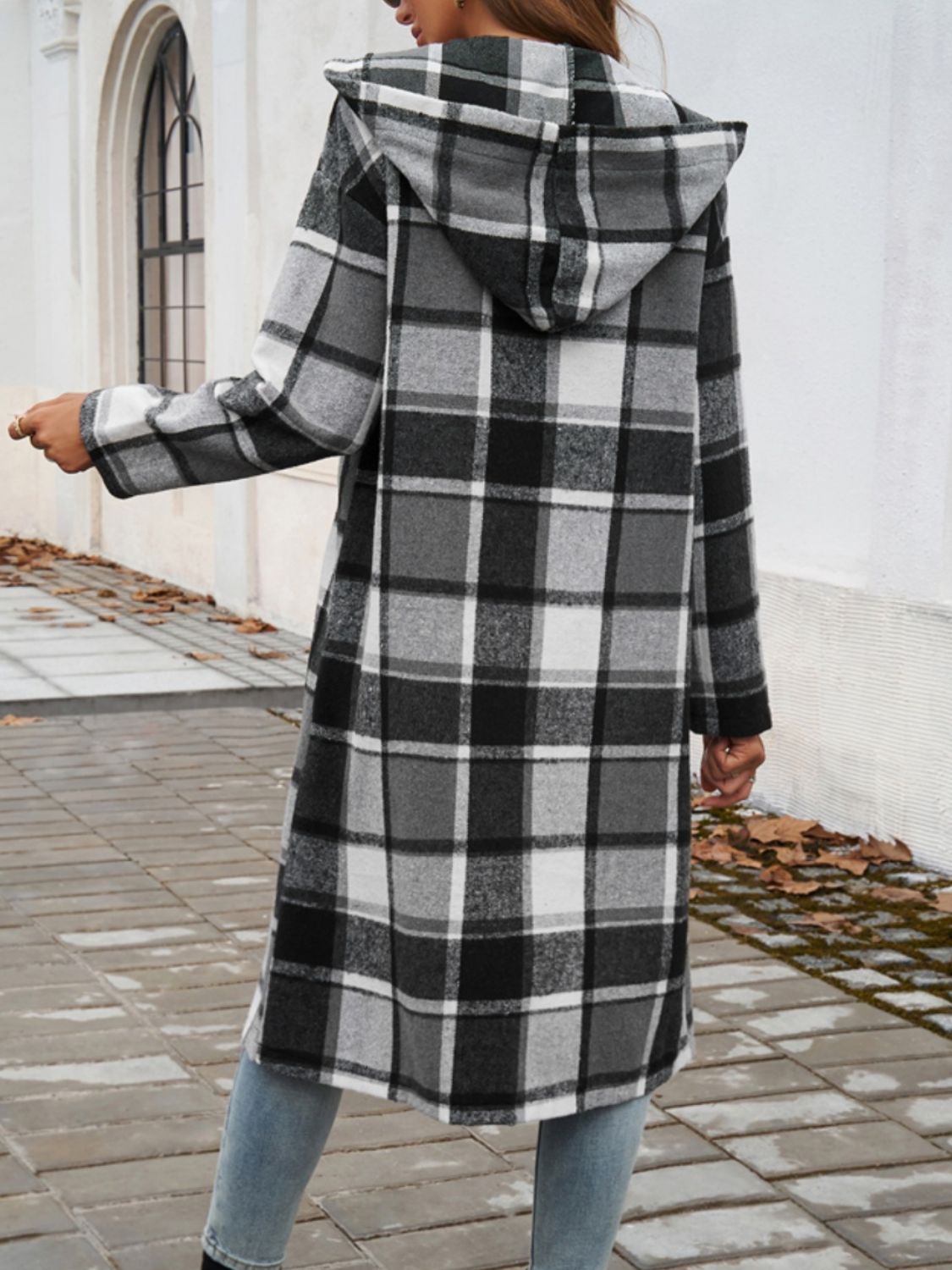 Plaid long sleeve hooded coat with button details and pockets.